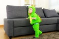 Baby boy with dinosaur halloween party costume