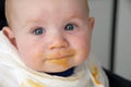 Baby boy with dirty face after a meal Royalty Free Stock Photo