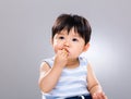 Baby boy eating biscuit Royalty Free Stock Photo