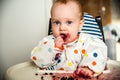 Baby boy eating blueberries Royalty Free Stock Photo