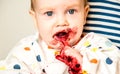 Baby boy eating blueberries Royalty Free Stock Photo