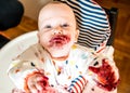 Baby boy eating blueberries Royalty Free Stock Photo