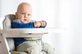 Baby boy eating with BLW method, baby led weaning Royalty Free Stock Photo