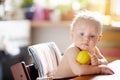 Baby boy eating healthy food Royalty Free Stock Photo