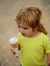 Baby boy eats icecream