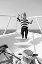 Baby boy enjoy vacation sea cruise ship. Child sailor. Boy sailor travelling sea. Boy sailor striped shirt sea yacht