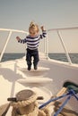 Baby boy enjoy vacation sea cruise ship. Child sailor. Boy sailor travelling sea. Boy sailor striped shirt sea yacht