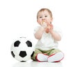 Baby boy football player with ball and whistle