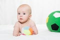 Cute baby girl lying down on his belly Royalty Free Stock Photo