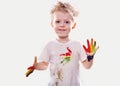 The baby boy with gouache soiled hands and shirt isolated Royalty Free Stock Photo