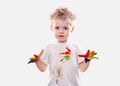 The baby boy with gouache soiled hands and shirt isolated Royalty Free Stock Photo