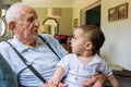 Baby boy with great grandfather Royalty Free Stock Photo