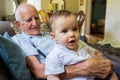 Baby boy with great grandfather Royalty Free Stock Photo