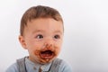 Baby boy happy after eating chocolate Royalty Free Stock Photo