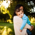 Baby boy in the park with his mum Royalty Free Stock Photo