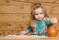 Baby boy in the kitchen cooking, playing with egg. Child to break the eggs. Royalty Free Stock Photo