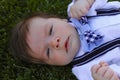 Baby boy laying in grass Royalty Free Stock Photo