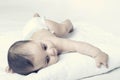 Baby boy lying on white towel Royalty Free Stock Photo