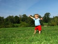 Baby boy on the meadow