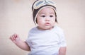 Baby boy newborn pilot aviator in hat brown color Royalty Free Stock Photo