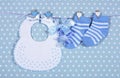 Baby boy nursery blue socks and bib