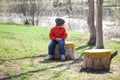 Baby boy in orange jaket and blue jeans Royalty Free Stock Photo