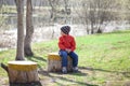 Baby boy in orange jaket and blue jeans Royalty Free Stock Photo