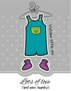 Baby boy overall and booties on dotted grey background