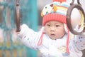 Baby boy play the swinging rings Royalty Free Stock Photo