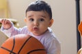 Baby Boy Playing with Basket Ball