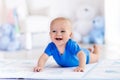 Baby boy playing and learning to crawl Royalty Free Stock Photo