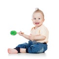 Baby boy playing with musical toys on white backgroun Royalty Free Stock Photo