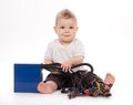 Baby boy playing with pc power supply on white