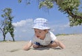Baby boy playing in sand on beach Royalty Free Stock Photo