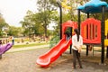 Baby boy playing with slide at kids park. galle, sri lanka