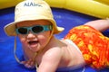 Baby Boy playing in a swimming pool Royalty Free Stock Photo