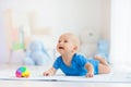 Baby boy playing with toy ball Royalty Free Stock Photo