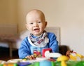 Baby boy playing toy Royalty Free Stock Photo