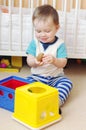 Baby boy playing toys at home Royalty Free Stock Photo