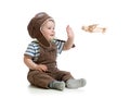 Baby boy playing with wooden plane Royalty Free Stock Photo