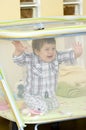 Baby boy in playpen Royalty Free Stock Photo