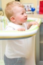 Baby boy in playpen. Royalty Free Stock Photo