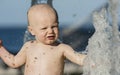 Baby Boy Plays in a Fountain in Mexico Royalty Free Stock Photo