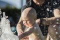 Baby Boy Plays in a Fountain in Mexico Royalty Free Stock Photo