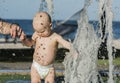 Baby Boy Plays in a Fountain While on Vacation in Mexico Royalty Free Stock Photo