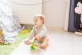 Baby boy plays in his room. Royalty Free Stock Photo