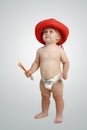 Baby boy in red cowboy hat