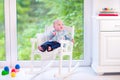 Baby boy in a rocking chair Royalty Free Stock Photo