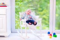 Baby boy on a rocking chair Royalty Free Stock Photo