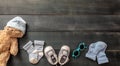 Baby boy shoes and socks on blue wooden background Royalty Free Stock Photo